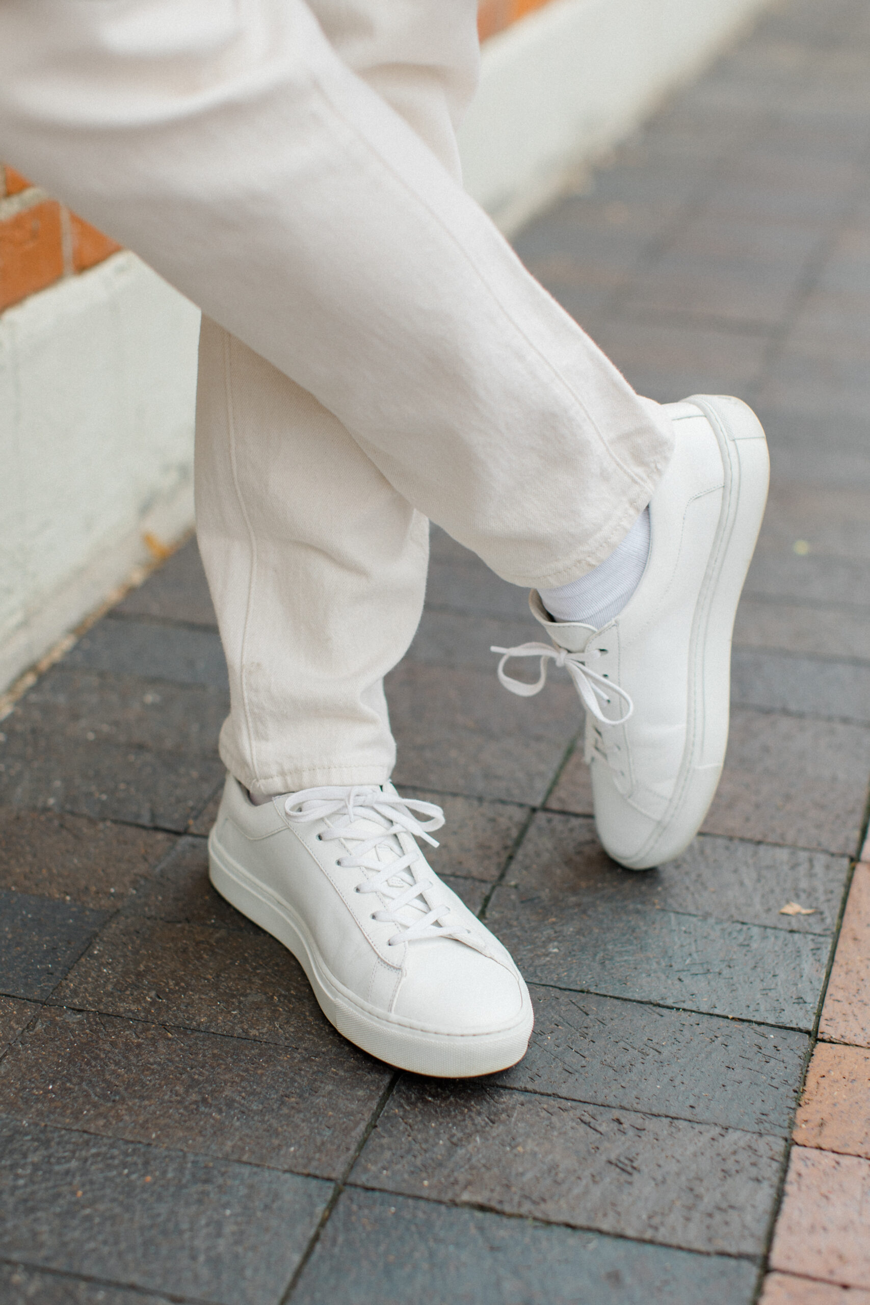 White sneakers at every price point: Koio Capri Triple White